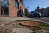 Sidewalk project spurs arborist to resign from tree board