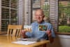 Postcard enthusiast meets the world through his (real) mailbox